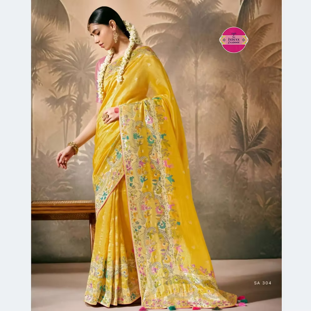 Premium Yellow Munga Silk Enhanced With Tassels Saree